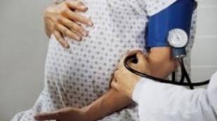 A pregnant woman in the ninth month needs a birth operation